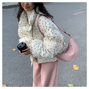 Stylish nylon crescent crossbody bag, lightweight casual dumpling shoulder bag detail.