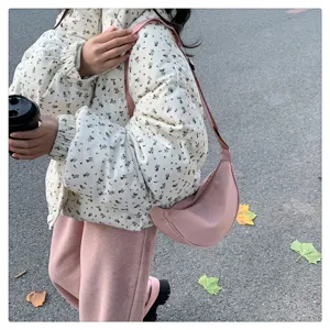 Lightweight nylon crescent crossbody bag for women, trendy dumpling shoulder bag for daily use.