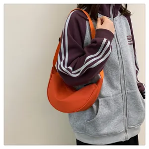 Women's nylon crescent crossbody bag, lightweight casual shoulder bag, trendy daily travel sports bag.