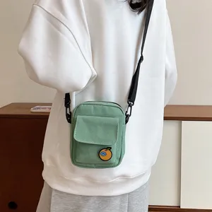 Cute green canvas crossbody bag for women and girls, casual shoulder phone bag for daily use.