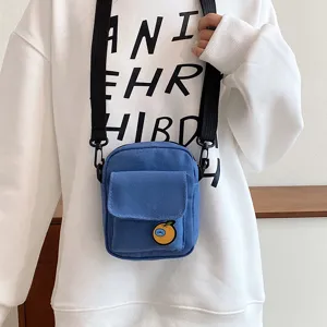 Cute blue canvas crossbody bag for girls, sweet casual shoulder phone bag with front pocket.