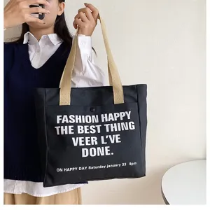 Canvas tote bag for women, large capacity shoulder bag with letter print, casual daily use.