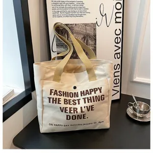 Large capacity canvas tote bag with front pocket and stylish English print for daily commute.