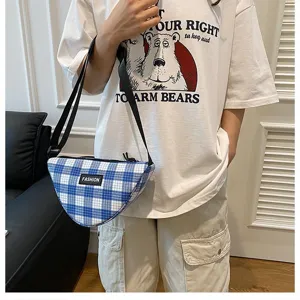 Blue and white plaid triangle crossbody bag, fashion casual shoulder bag for women daily use.