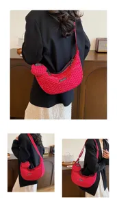 Red crescent crossbody bag with mini pouch, stylish canvas shoulder bag for daily use.