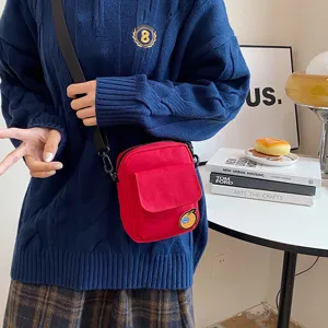 Red canvas crossbody bag for women, cute small shoulder phone bag with sweet style.