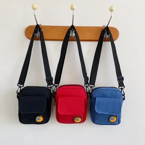Canvas crossbody bag for girls, cute mini shoulder bag, casual student phone pouch.