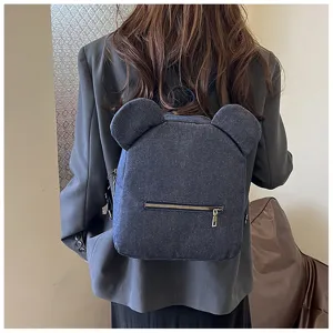 Mini denim backpack with cute bear ears design, casual student school bag details for daily.