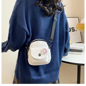 Sac bandoulière en toile coréen pour femme sac décontracté avec joli badge de lapin