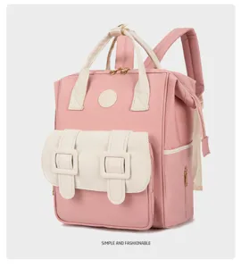 Multi-functional pink diaper backpack with large capacity for stylish moms and baby care.