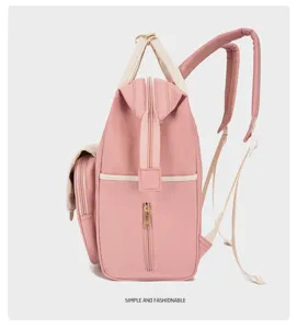 Multi-functional pink diaper backpack with large capacity stylish mummy bag detail view.