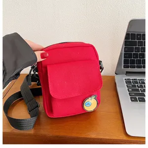 Red canvas crossbody bag for women, cute Japanese style small shoulder bag with cute badge.