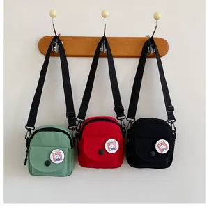 Sac bandoulière en toile style coréen pour femme, petit sac mignon avec badge de joli lapin.