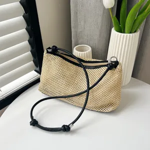 Chic straw shoulder bag for women, stylish vintage woven underarm bag with black leather strap.