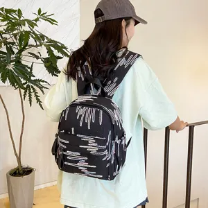 Niedlicher japanischer schwarzer Mini-Rucksack für Damen und Mädchen mit einzigartigem Wellenmuster.
