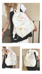 Sac a dos blanc stylé avec adorables pendentifs en peluche étoile et os école