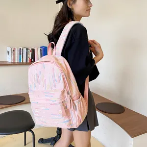 Rosa süßer Mädchen Mini Rucksack lässiger schicker Schulrucksack mit buntem Textur Design.