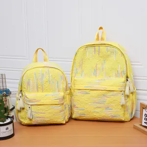 Süßes gelbes Schüler Rucksack Set mit bunter Stickerei, Mini und große Größen für Mädchen.