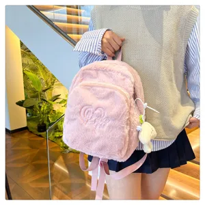 Japanese style cute pink plush backpack for women, soft furry school bag with heart embroidery.