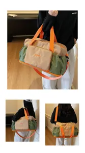 Detail view of women travel duffel bag, waterproof gym bag with dry wet separation and straps.