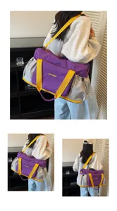 Stylish purple grey travel gym bag with yellow straps, wet dry separation design for women.