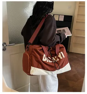 Fashionable short-distance travel duffel bag with shoulder strap and spacious interior design