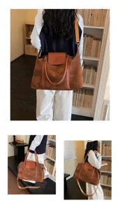 Detailed view of the stylish oil painting print travel duffel bag with leather handles.