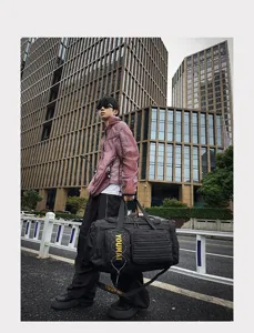 Detailed shot of a black multi-functional travel duffel bag with spacious storage, ideal for gym or trips.