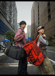 Multi-functional travel duffel bag for sports, fitness, and outdoor portable storage use.