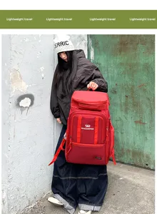 Large capacity travel backpack in vibrant red, lightweight and durable for outdoor and sports.