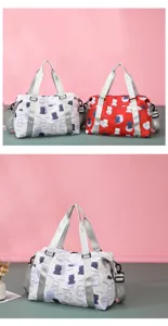 Detailed view of the cute bear print travel duffel bag with durable silver straps and spacious design.