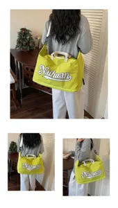 Bolso de viaje verde grande y moderno con estampado de letras para ir al trabajo y fines