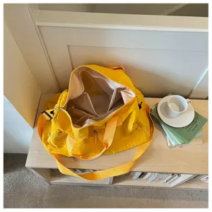 Bolsa de viaje casual amarilla con múltiples compartimentos y correa para fitness.