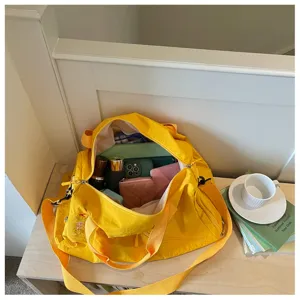 Bolso de viaje deportivo amarillo casual para fitness yoga, gran bolsa de almacenamiento de equipaje.