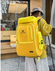 Large capacity yellow travel backpack with multiple zip pockets for outdoor sports and hiking.