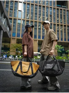 Outdoor travel duffel bag detail scene, large capacity luggage storage handbag for camping.