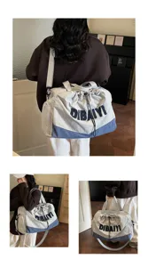 Stylish casual travel duffel bag with shoulder strap, minimalist design for commute and trips.