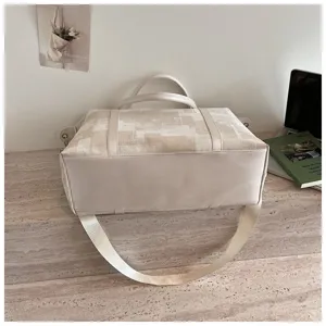 Beige oil painting travel bag detail view, multi-functional casual shoulder duffel bag.