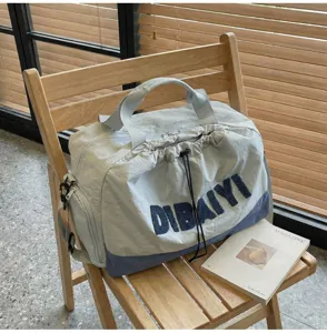 Stylish short-distance travel duffel bag minimalist commuter messenger bag for weekend trips.