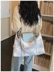 Canvas travel duffel bag for women, blue oil painting print weekender shoulder bag for commuting.