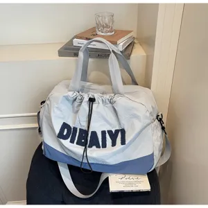 Gray blue casual travel duffel bag with stylish front letters, lightweight commute shoulder bag.