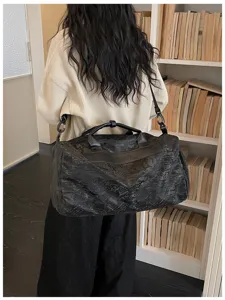 Sac de voyage court trajet léger et élégant, sac bandoulière décontracté pour bureau et sport.