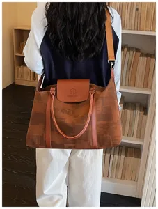 Brown oil painting style travel shoulder bag, multi-functional commuting messenger bag.
