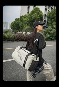 Fashion large capacity travel duffel bag sports gym shoulder bag for commuter travel.