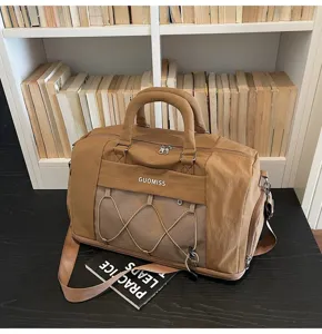 Casual khaki travel duffel bag with mesh pocket and shoulder strap for fitness and trips.