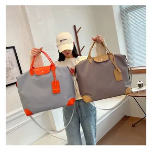 Large capacity waterproof travel bag, lightweight folding luggage bag with handles for daily use.