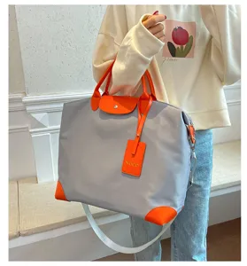 Large capacity waterproof travel duffel bag lightweight gym sports luggage bag with orange accents