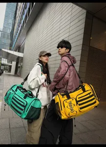 Stylish large capacity travel duffel bag for fitness and sports, multi-pocket portable design.