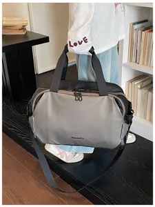 Fashionable color-block travel duffel bag for short trips, commuting, and gym workouts. Durable.