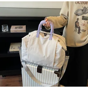 Large capacity travel duffel bag for short trips, business, and daily fitness use.